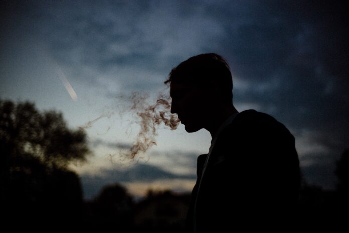 A smoke break with a musician in Stuttgart, Germany. // www.johannes-roth.com