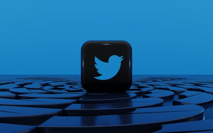 a cell phone with a twitter logo on it